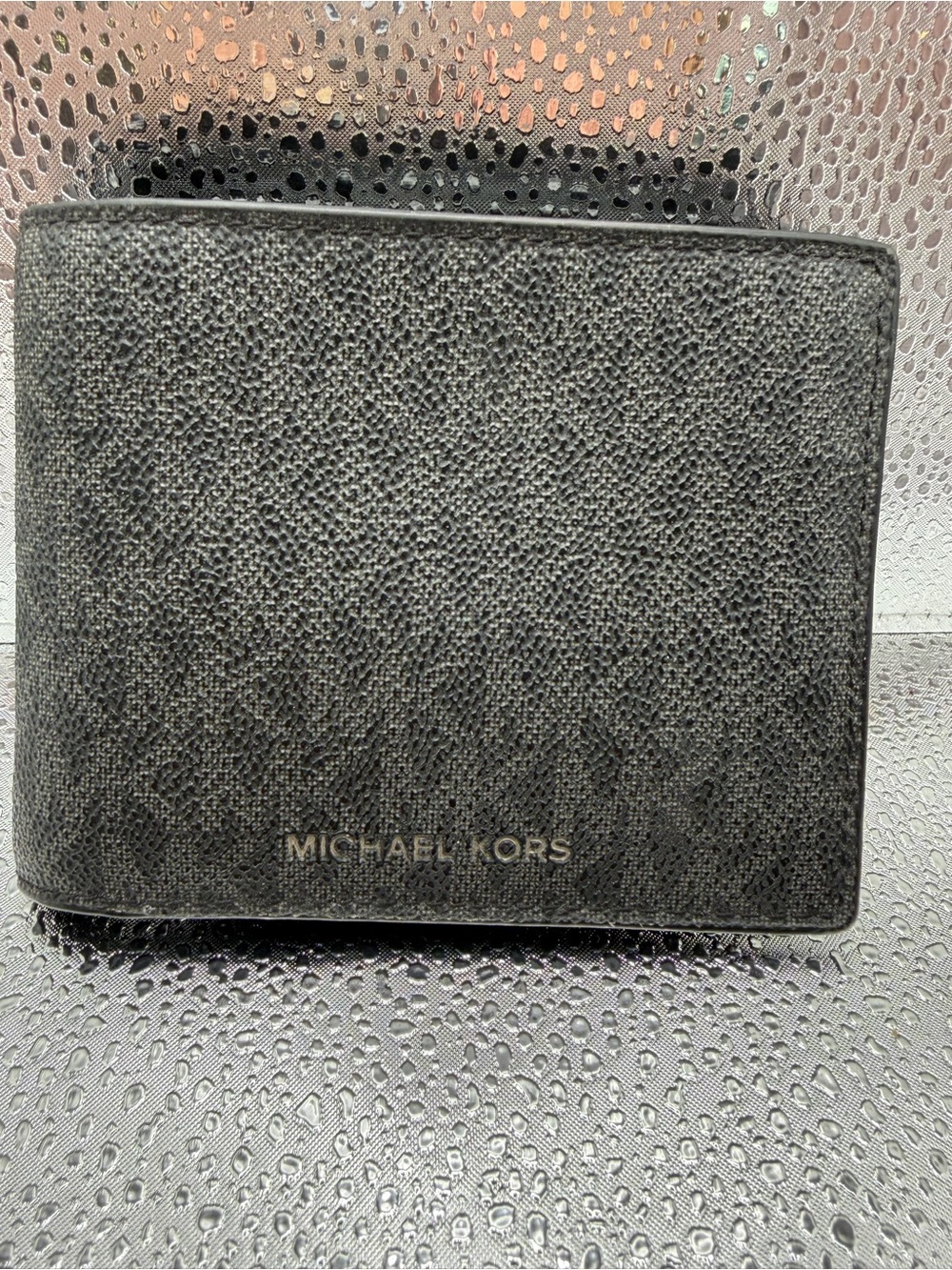 Michael Kors Black Textured Leather Bi-Fold Wallet with Gold Logo